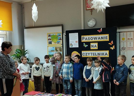 Grafika 2: Pasowanie na czytelnika