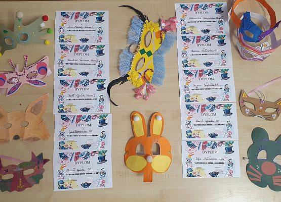 Grafika 1: Konkurs -  ,,NAJPIĘKNIEJSZA MASKA KARNAWAŁOWA”.