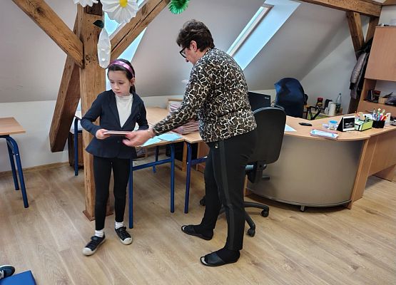 Grafika 11: Pasowanie na Czytelnika