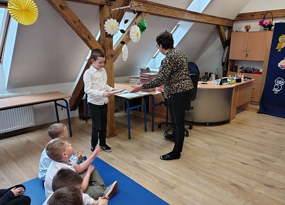 Grafika 10: Pasowanie na Czytelnika