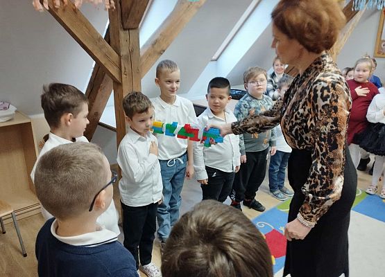 Grafika 11: Pasowanie na Świetliczaka