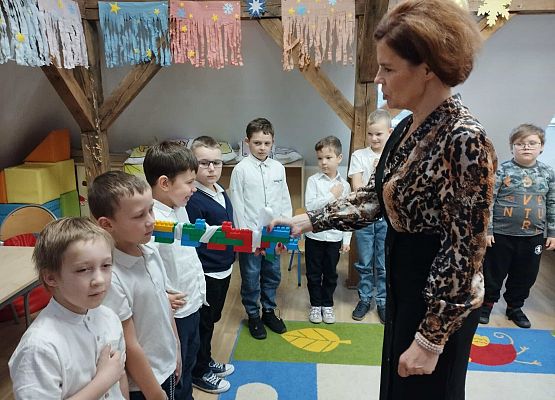 Grafika 10: Pasowanie na Świetliczaka